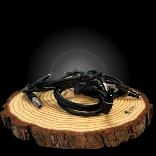 Uk stocked night vision cables on a display stand, cables consist of 4Pin Fischer, 4Pin Lemo and 00B Lemo.