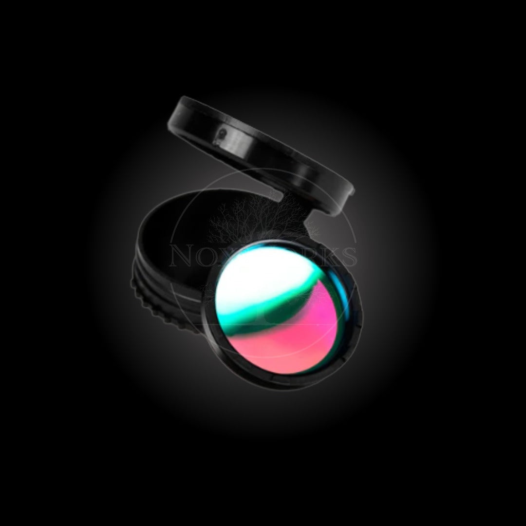 PVS-14 light interference filter on a black background with a noxworks watermark
