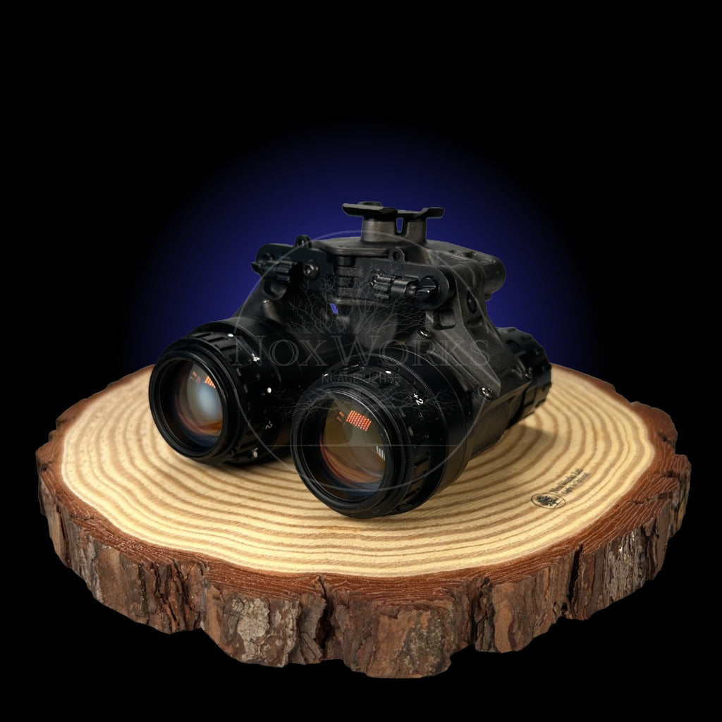 Night Vision Binoculars, the nocturn industries raptor, Built In The UK Displayed from the back on a wooden board