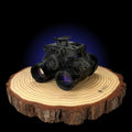 Night Vision Binoculars, the nocturn industries raptor, Built In The UK Displayed from the front on a wooden board